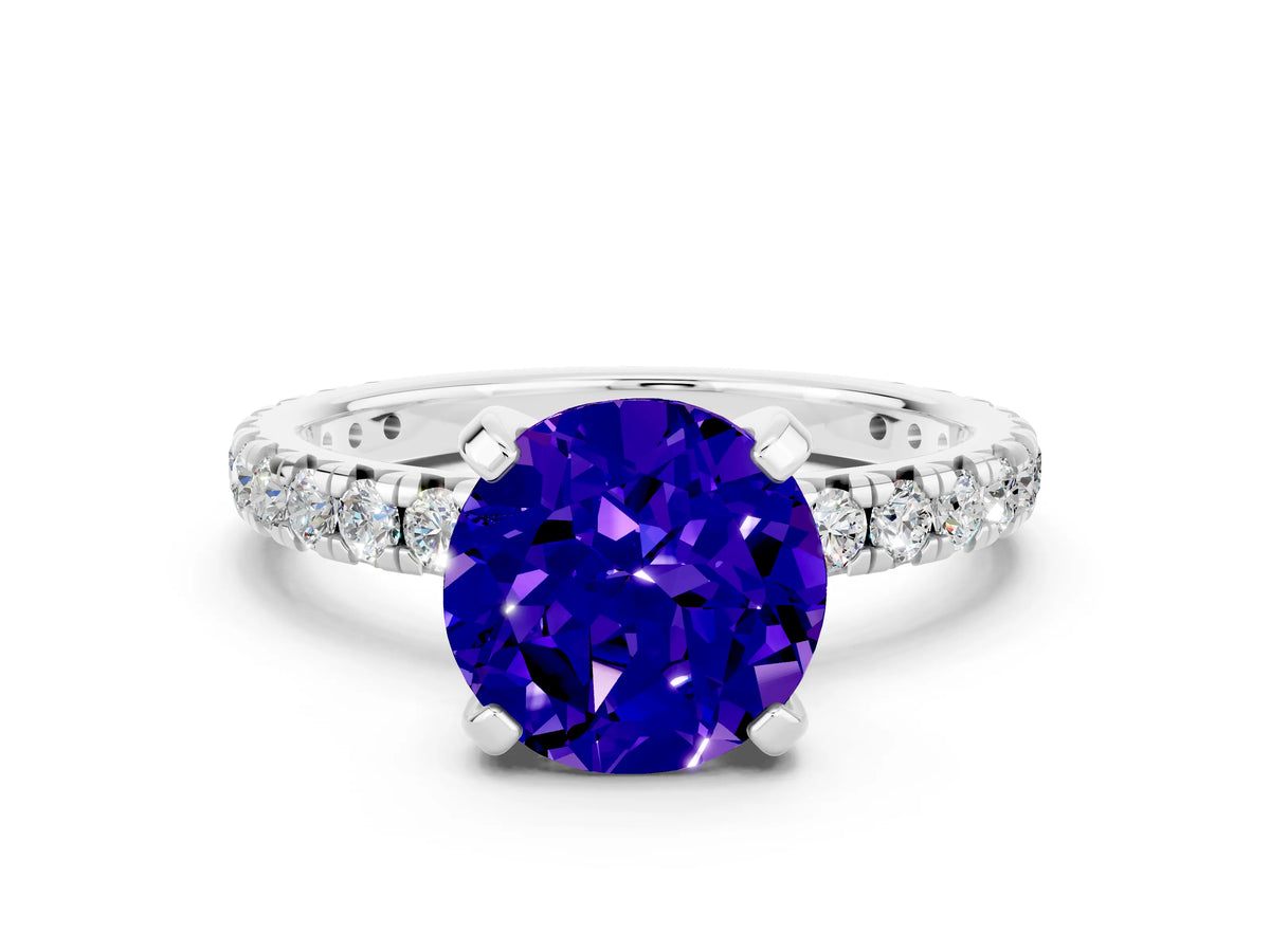 Round Cut Tanzanite Pavé Solitaire Ring in White gold with Round Pavé Band and Prong Setting