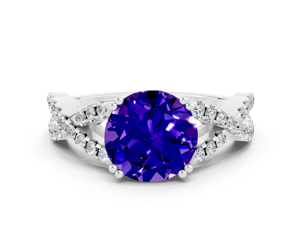 Round Cut Tanzanite Solitaire Ring in White gold with Interwoven Pavé Band and Prong Setting
