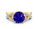 Round Cut Tanzanite Solitaire Ring in Yellow gold with Interwoven Pavé Band and Prong Setting