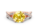 Round Cut Yellow Sapphire Solitaire Ring in Rose gold with Interwoven Pavé Band and Prong Setting