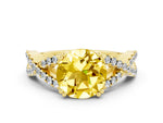 Round Cut Yellow Sapphire Solitaire Ring in Yellow gold with Interwoven Pavé Band and Prong Setting