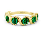 Round Emerald Half Eternity Band in Yellow gold with Wave Prong Setting
