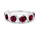 Round Garnet Half Eternity Band in Platinum with Wave Prong Setting