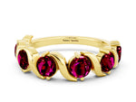 Round Garnet Half Eternity Band in Yellow gold with Wave Prong Setting