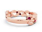 Round Garnet Leaf Motif Eternity Band in Rose gold with Bezel Setting