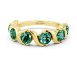 Round Green Sapphire Half Eternity Band in Yellow gold with Wave Prong Setting