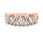 Round Moissanite Channel Set Band in Rose gold with X-Prong Detail