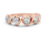 Round Moissanite Wave Band in Rose gold with Channel Setting and Shared Prongs