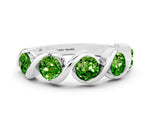 Round Peridot Wave Band in Silver with Channel Setting and Shared Prongs