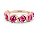 Round Pink Sapphire Half Eternity Band in Rose gold with Wave Prong Setting
