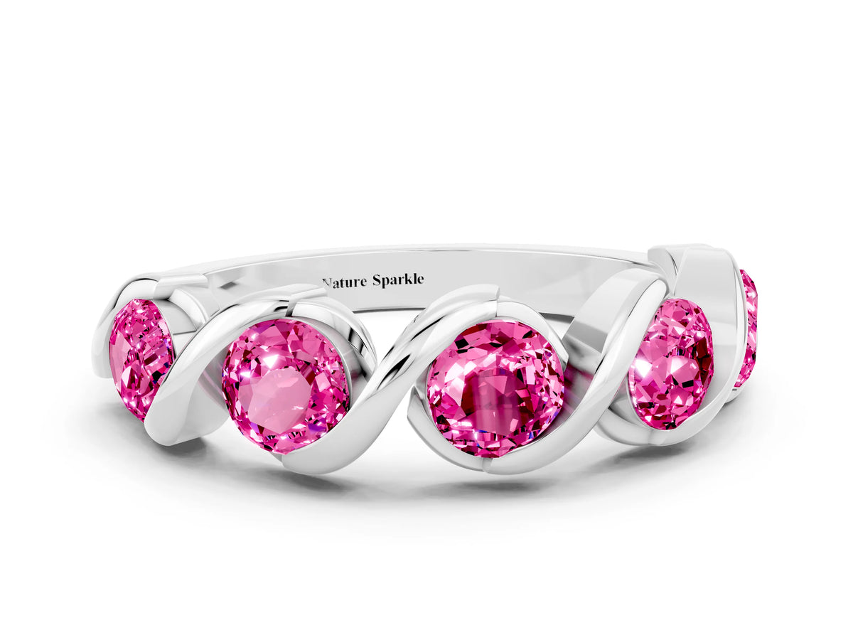 Round Pink Sapphire Wave Band in White gold with Channel Setting and Shared Prongs