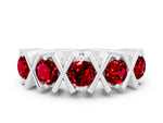 Round Ruby Channel Set Band in Platinum with X-Prong Detail