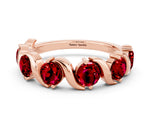 Round Ruby Half Eternity Band in Rose gold with Wave Prong Setting