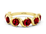 Round Ruby Half Eternity Band in Yellow gold with Wave Prong Setting