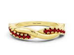 Round Ruby Twisted Infinity Band in Yellow gold with Prong Setting