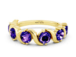 Round Tanzanite Half Eternity Band in Yellow gold with Wave Prong Setting