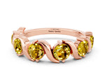 Round Yellow Sapphire Half Eternity Band in Rose gold with Wave Prong Setting
