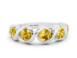 Round Yellow Sapphire Wave Band in White gold with Channel Setting and Shared Prongs