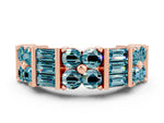 Round and Baguette Blue Topaz Anniversary Band in Rose gold with Channel and Prong Setting