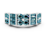 Round and Baguette Blue Topaz Anniversary Band in Silver with Channel and Prong Setting