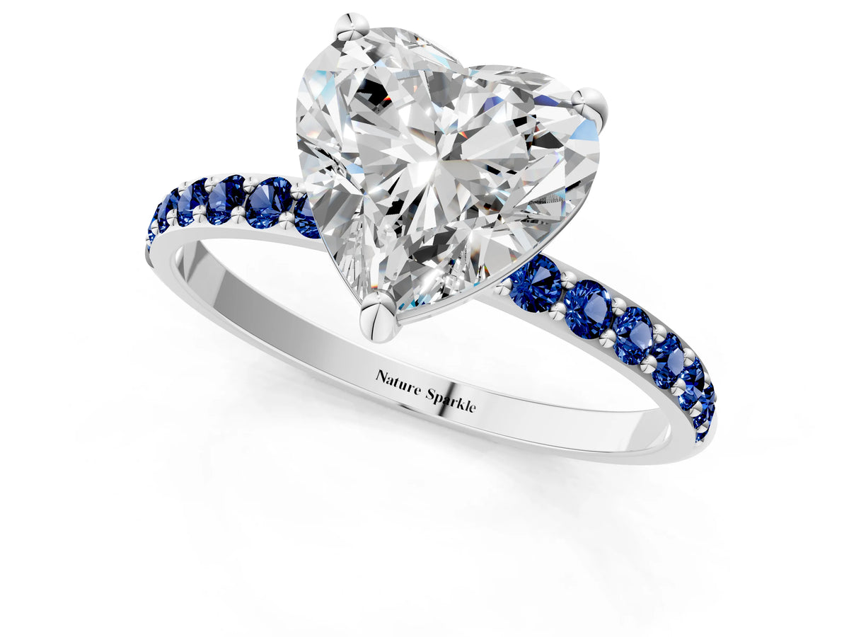 Silver Heart Cut Diamond Solitaire Ring with Round Blue Sapphire Pavé Band and Prong Setting_13