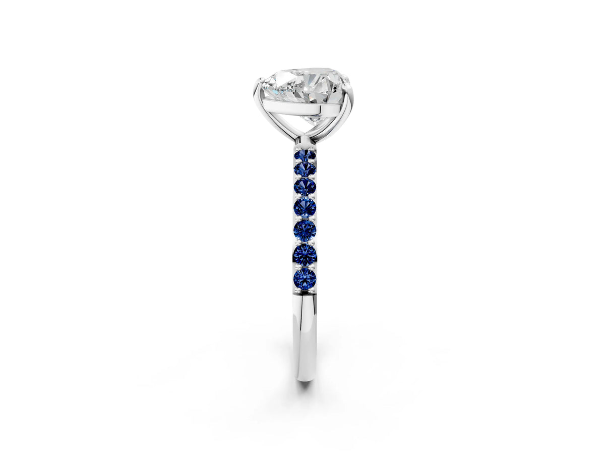 Silver Heart Cut Diamond Solitaire Ring with Round Blue Sapphire Pavé Band and Prong Setting_14
