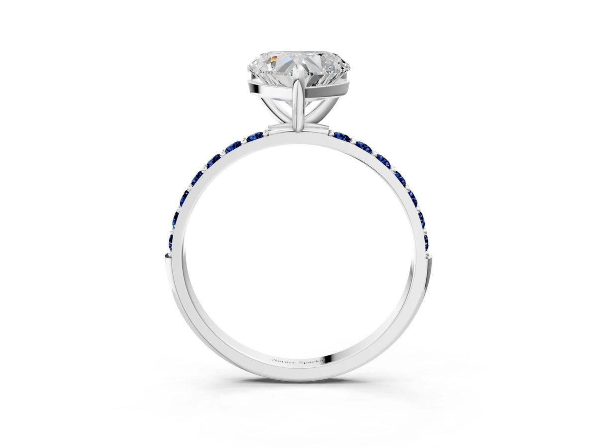 Silver Heart Cut Diamond Solitaire Ring with Round Blue Sapphire Pavé Band and Prong Setting_15