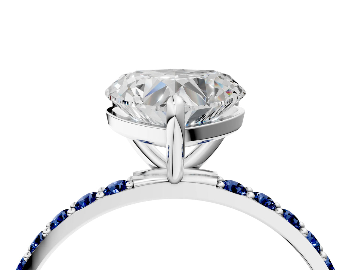 Silver Heart Cut Diamond Solitaire Ring with Round Blue Sapphire Pavé Band and Prong Setting_16