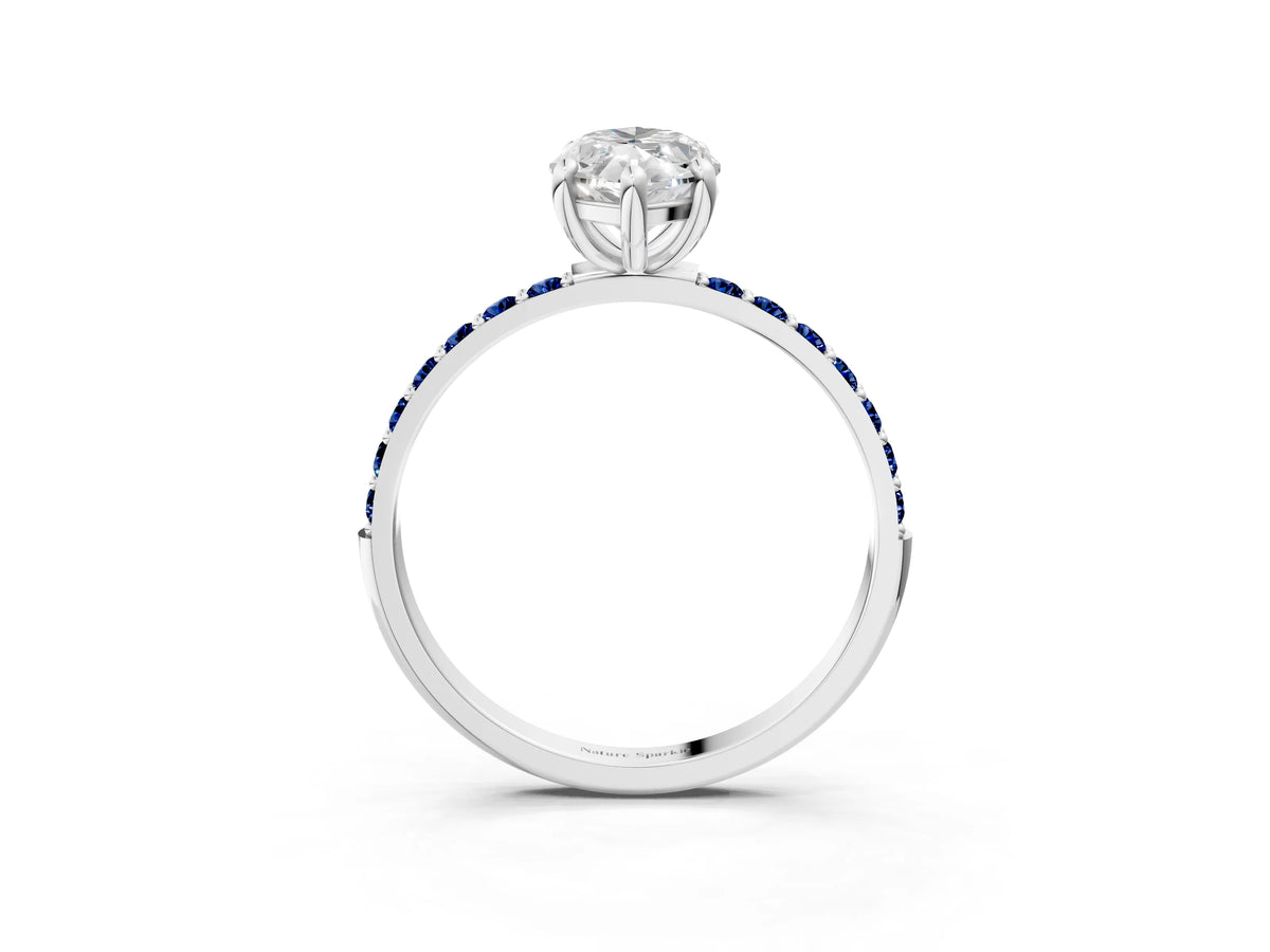 Silver Marquise Cut Diamond Solitaire Ring with Round Blue Sapphire Pavé Band and Prong Setting_15