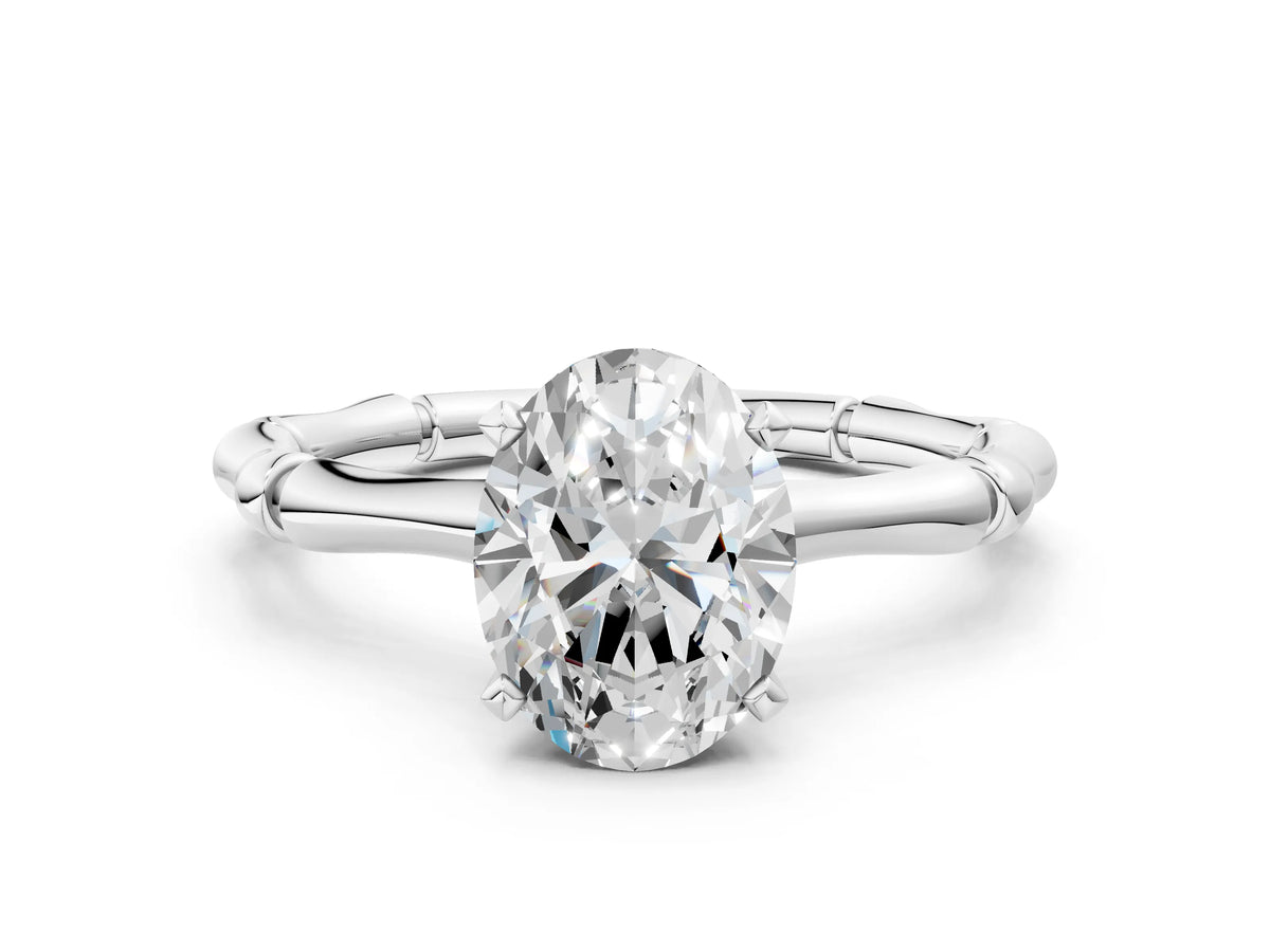 Silver Oval Cut Solitaire Diamond Ring with Bamboo Band and Four-Prong Setting_12