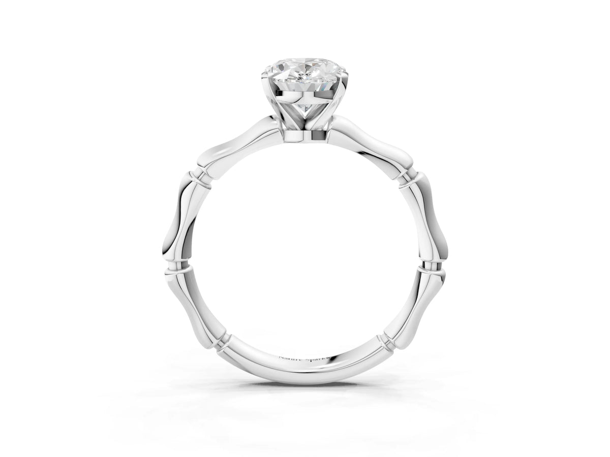 Silver Oval Cut Solitaire Diamond Ring with Bamboo Band and Four-Prong Setting_15
