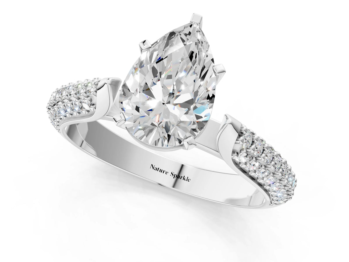 Silver Pear Cut Diamond Solitaire Engagement Ring with Multi-Row Round Pavé Band and Prong Setting_13