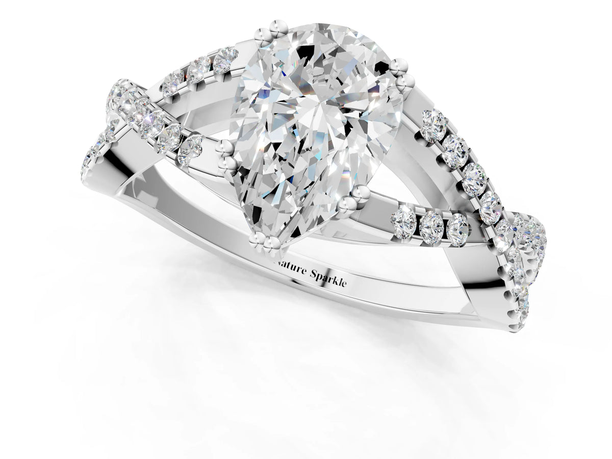Silver Pear Cut Diamond Solitaire Ring with Four-Prong Setting and Twisted Pavé Band_7
