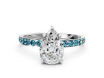 Silver Pear Cut Diamond Solitaire Ring with Round Blue Topaz Pavé Band and Prong Setting_12