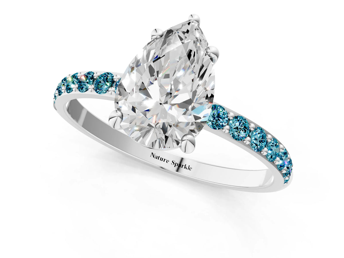 Silver Pear Cut Diamond Solitaire Ring with Round Blue Topaz Pavé Band and Prong Setting_13