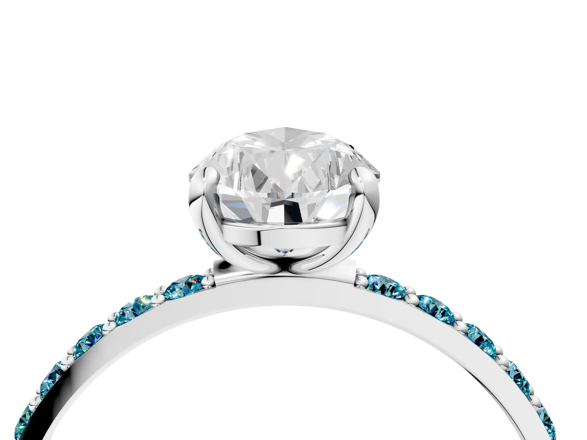 Silver Pear Cut Diamond Solitaire Ring with Round Blue Topaz Pavé Band and Prong Setting_16