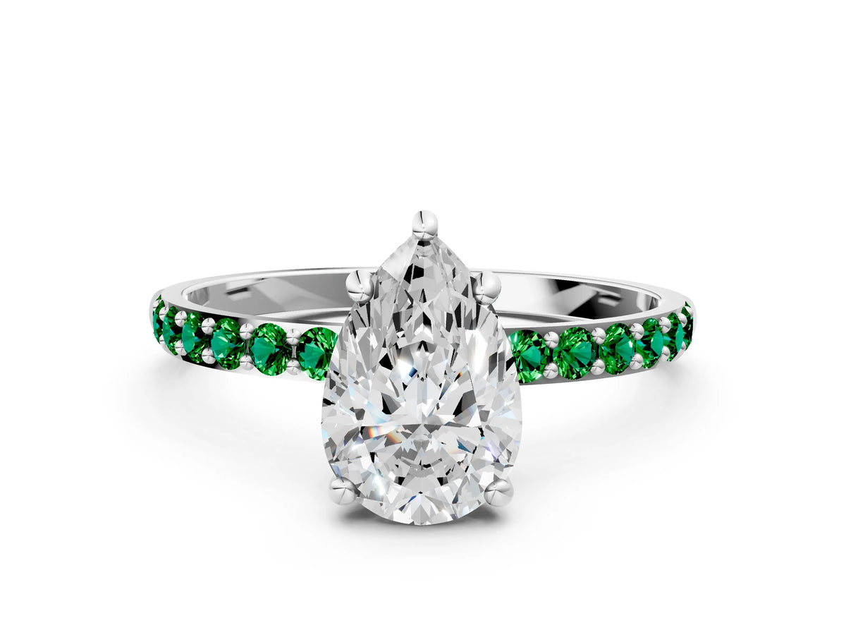 Silver Pear Cut Diamond Solitaire Ring with Round Emerald Pavé Band and Prong Setting_12