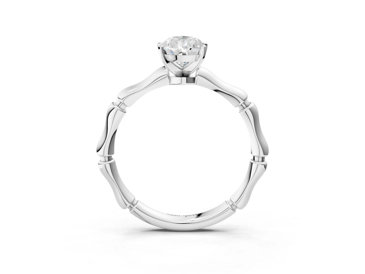 Silver Pear Cut Solitaire Diamond Ring with Bamboo Band and Four-Prong Setting_15