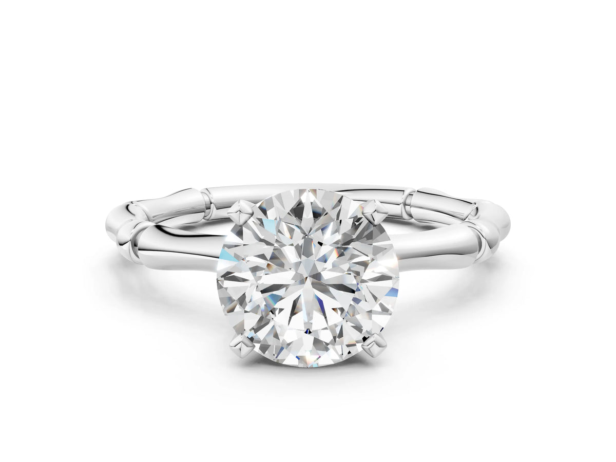 Silver Round Cut Solitaire Diamond Ring with Bamboo Band and Four-Prong Setting_48