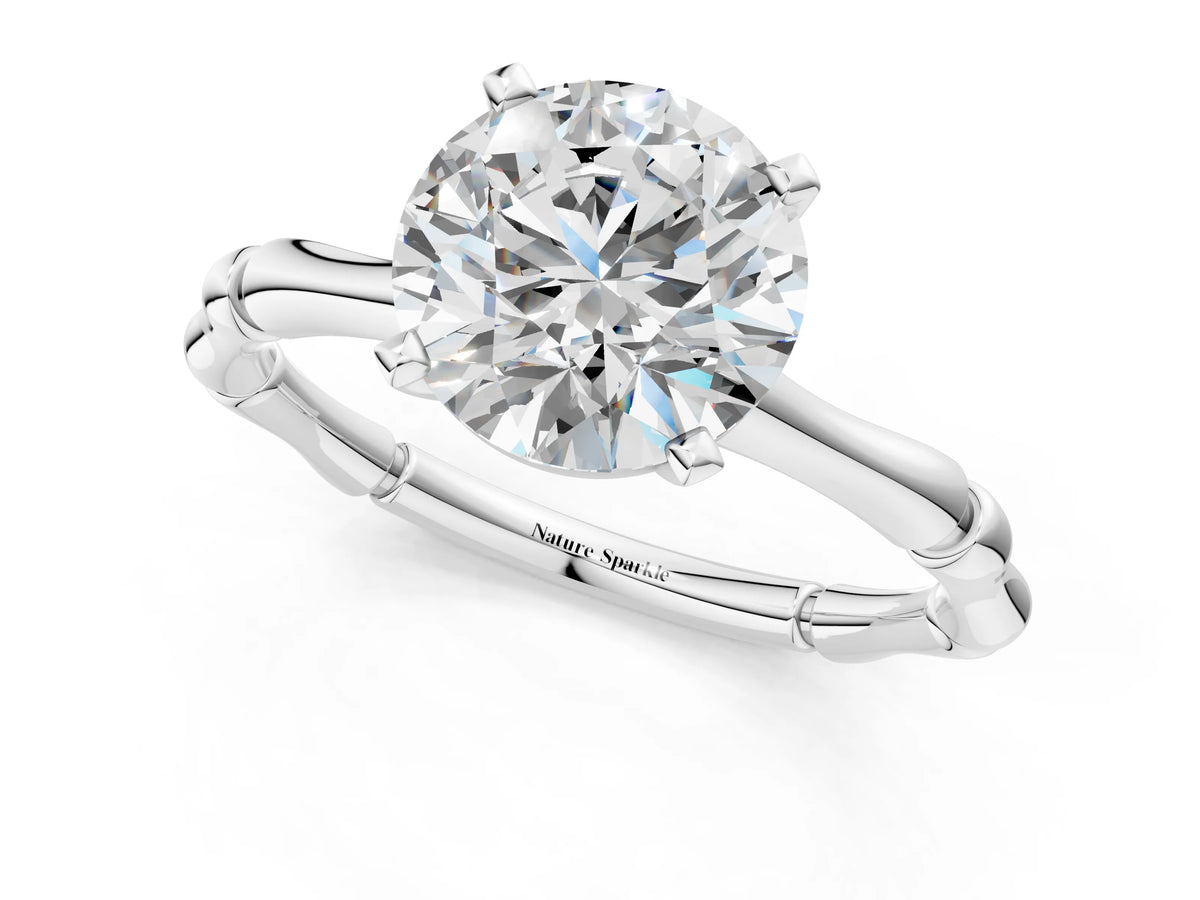 Silver Round Cut Solitaire Diamond Ring with Bamboo Band and Four-Prong Setting_49