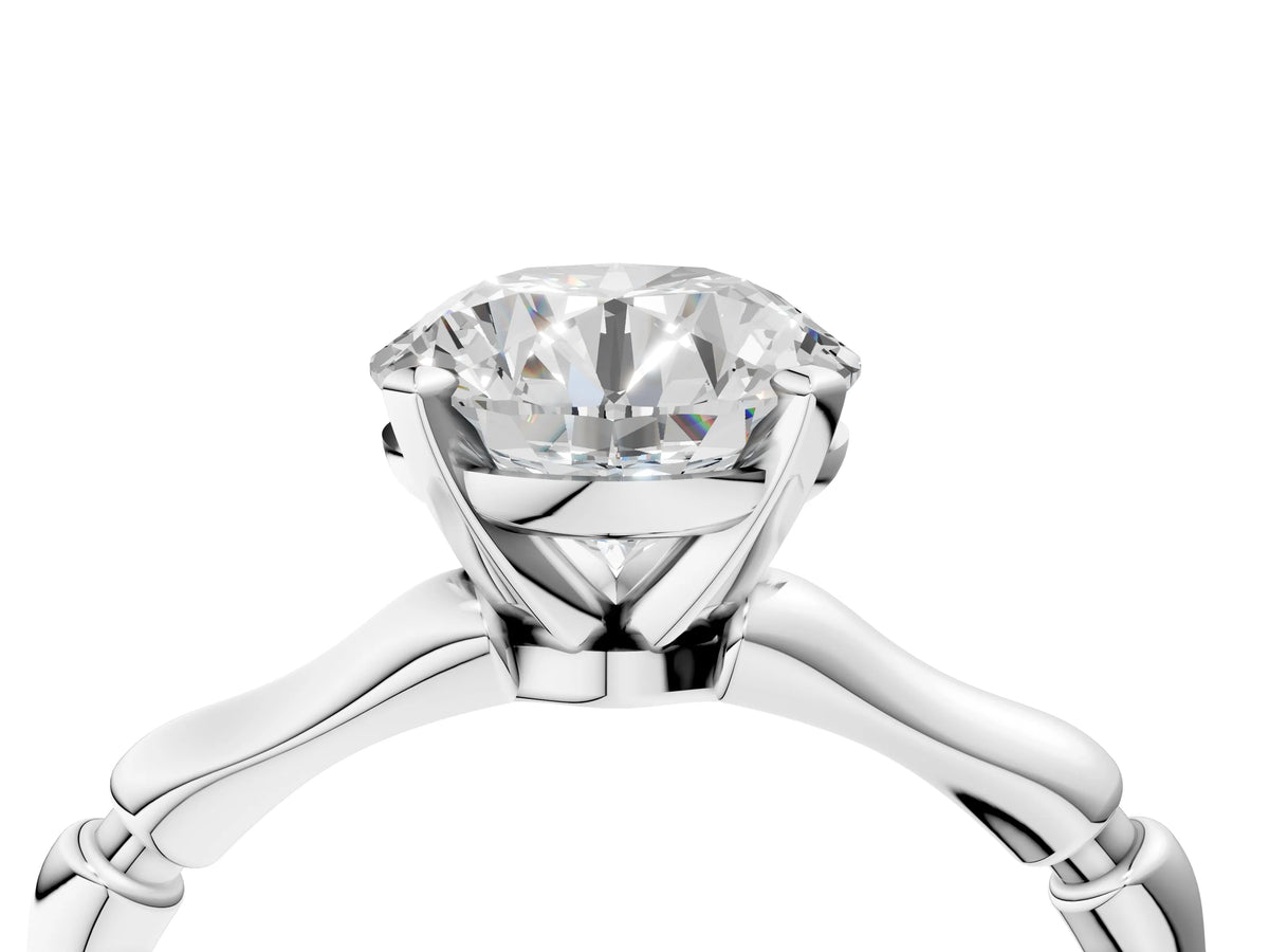 Silver Round Cut Solitaire Diamond Ring with Bamboo Band and Four-Prong Setting_52