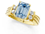 Three-Stone Fancy Blue Emerald Cut Diamond Channel Set Ring in Yellow gold with Bar Prongs_1