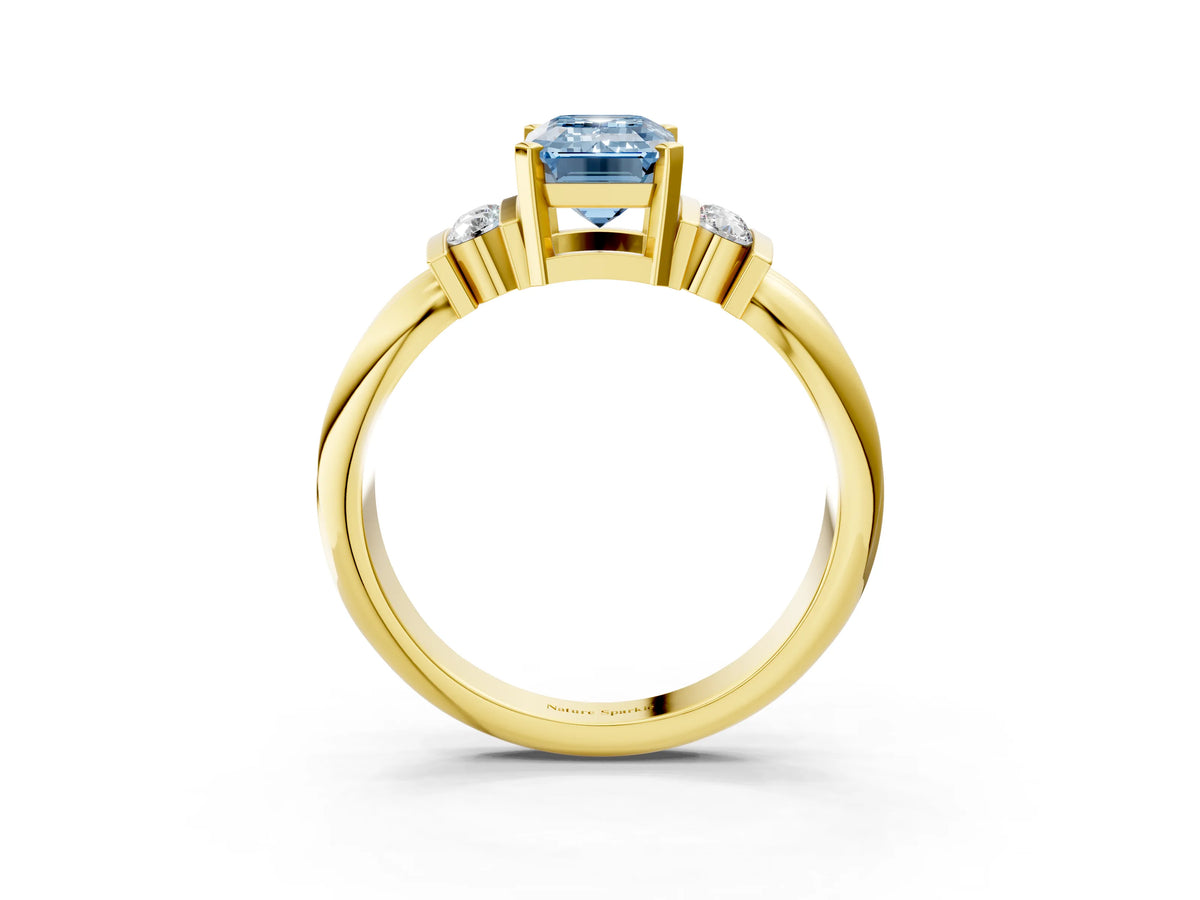 Three-Stone Fancy Blue Emerald Cut Diamond Channel Set Ring in Yellow gold with Bar Prongs_3