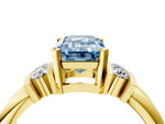 Three-Stone Fancy Blue Emerald Cut Diamond Channel Set Ring in Yellow gold with Bar Prongs_4