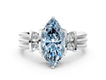 Three-Stone Fancy Blue Marquise Cut Diamond Channel Set Ring in White gold with Bar Prongs