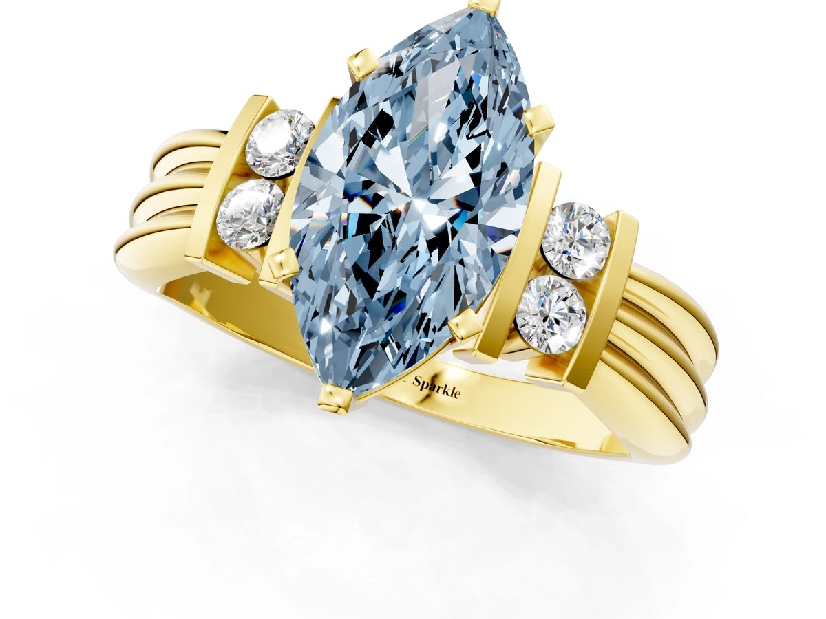 Three-Stone Fancy Blue Marquise Cut Diamond Channel Set Ring in Yellow gold with Bar Prongs_1