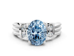 Three-Stone Fancy Blue Oval Cut Diamond Channel Set Ring in White gold with Bar Prongs