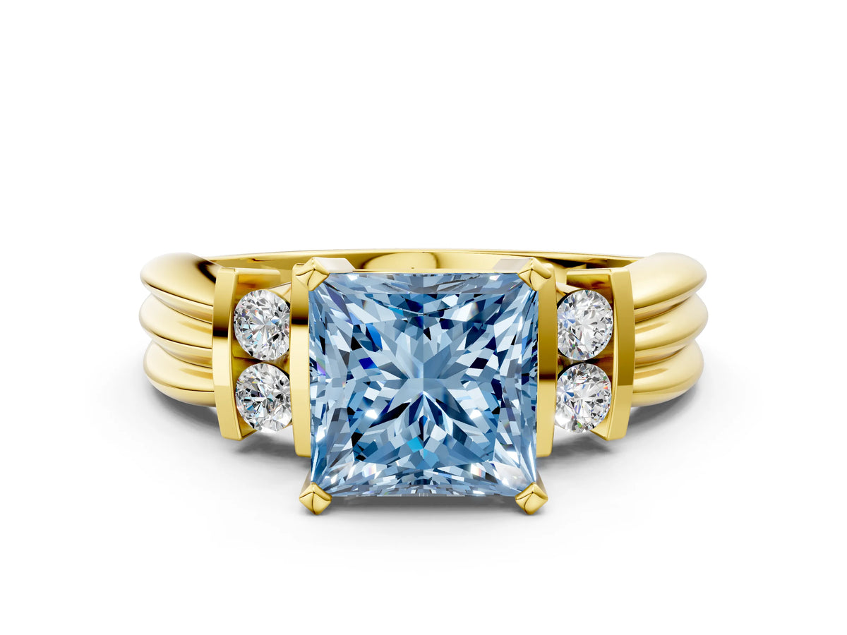 Three-Stone Fancy Blue Princess Cut Diamond Channel Set Ring in Yellow gold with Bar Prongs