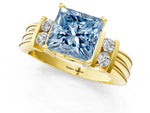 Three-Stone Fancy Blue Princess Cut Diamond Channel Set Ring in Yellow gold with Bar Prongs_1