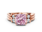 Three-Stone Fancy Pink Cushion Cut Diamond Channel Set Ring in Rose gold with Bar Prongs